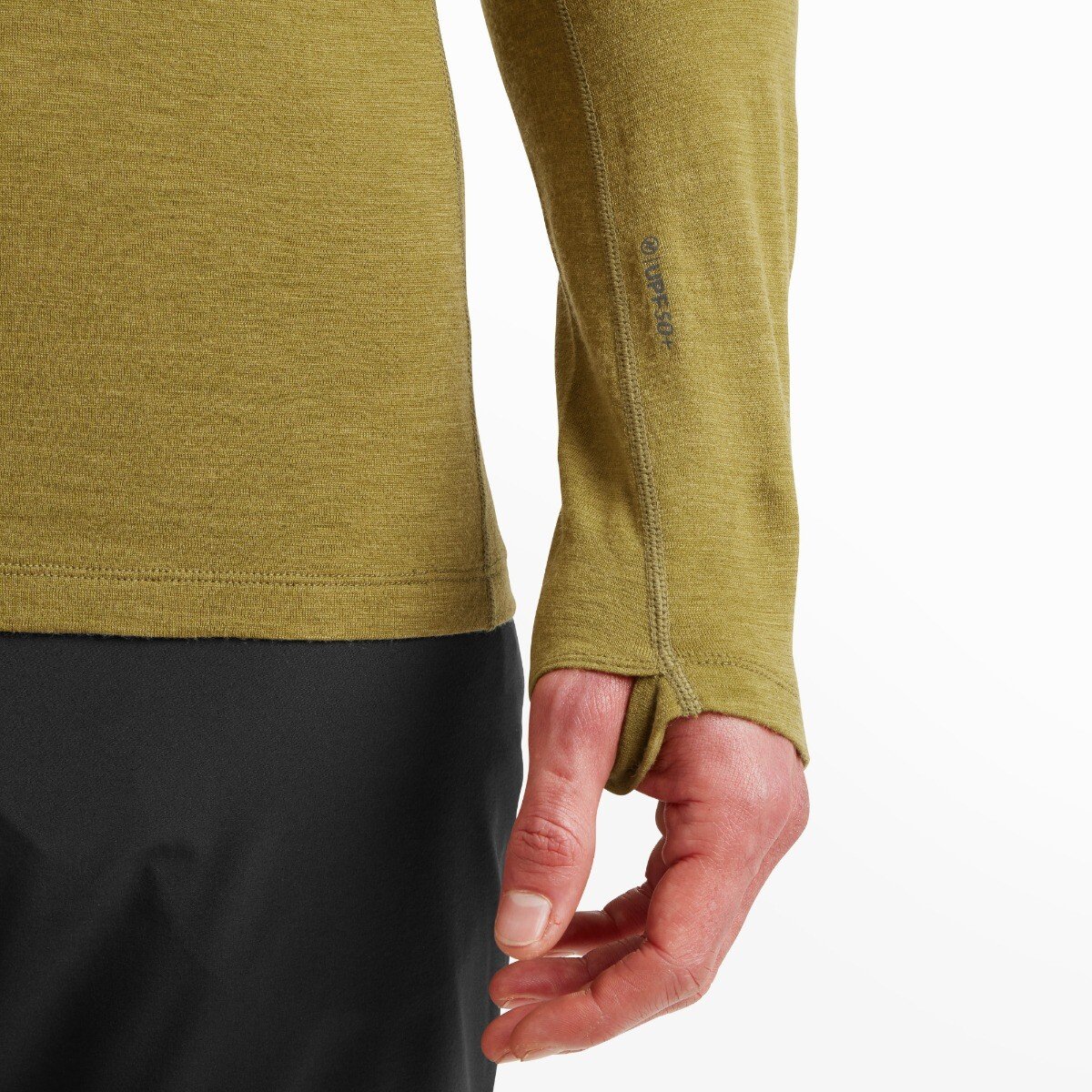 Close-up of the left sleeve hem on the Artilect Performance Mens Exposure Hoodie in Green showcasing the thumbhole feature and a small printed “UPF 50+” label, indicating UV protection. The green fabric is soft and slightly heathered.