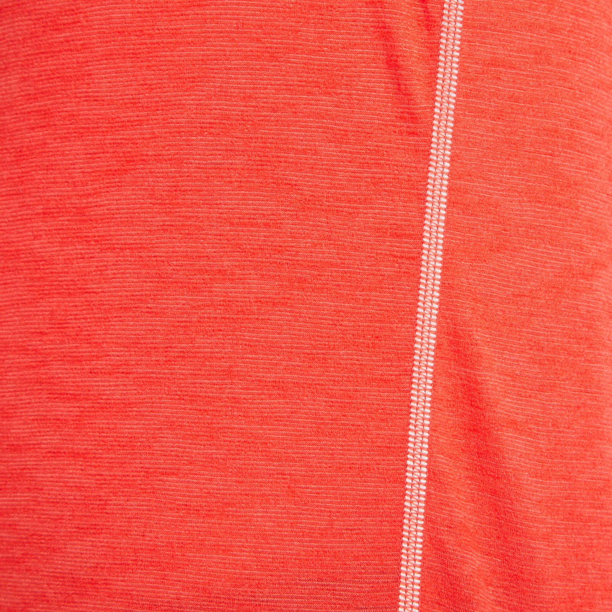 A macro detail of the Artilect Performance Womens Sprint Tee Red’s fabric showing a flatlock seam. The seam features tight, evenly spaced contrast stitching running vertically, highlighting the high-performance and technical construction of the garment.